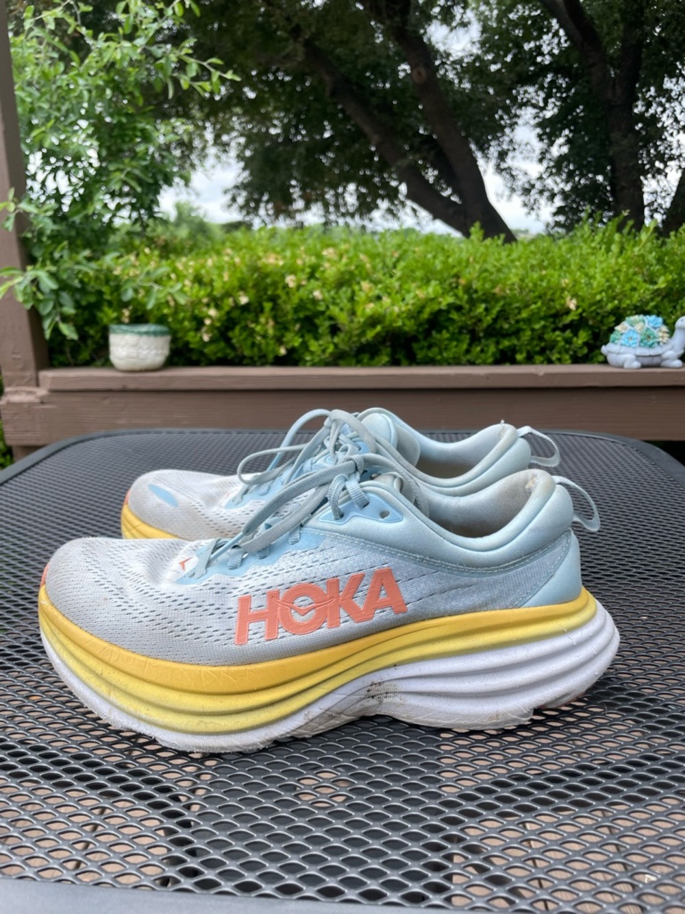Women’s size 9.5 HOKA One One Light Blue and Yellow Running Shoes